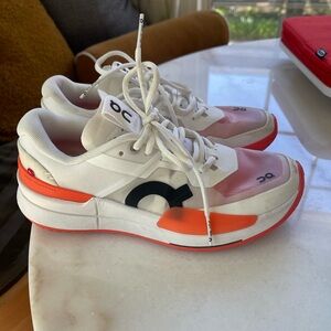 On Cloud The Roger Pro 2 hard court tennis shoes in White with Coral Accents